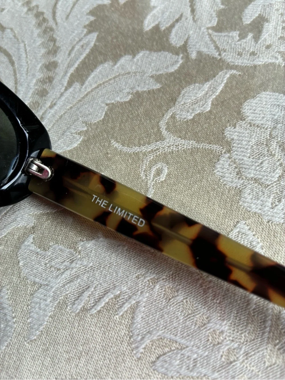 The Limited Black Oval Sunglasses with Tortoiseshell Temples